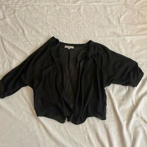 Woman’s button up see through top